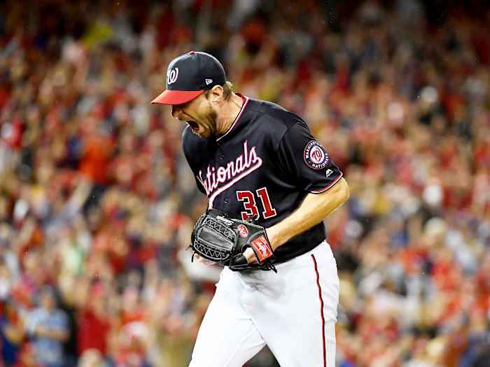 Oct 7, 2019; Washington, DC, USA; Washington Nationals starting pitcher Max Scherzer (31) reacts after the last out of the top of the seventh inning against the Los Angeles Dodgers in game four of the 2019 NLDS playoff baseball series at Nationals Park. Mandatory Credit: Brad Mills-USA TODAY Sports